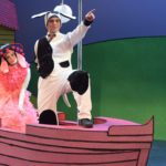 Miriam Guterriez and Al Kroeten in Go Dog Go, dressed as dogs sailing in a boat