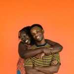 Kevin Jones as Ziggy and Nyarok (Rayn) Tot as Nansi in The Rose Theater's production of BOB MARLEY'S THREE LITTLE BIRDS, playing February 23 - March 10, 2024.