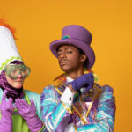 Wayne Hudson II as Willy Wonka and Ren Walther as Oompa Loompa in The Rose Theater's production of CHARLIE AND THE CHOCOLATE FACTORY, playing June 7 - 23, 2024.