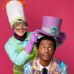 Wayne Hudson II as Willy Wonka and Ren Walther as Oompa Loompa in The Rose Theater's production of CHARLIE AND THE CHOCOLATE FACTORY, playing June 7 - 23, 2024.