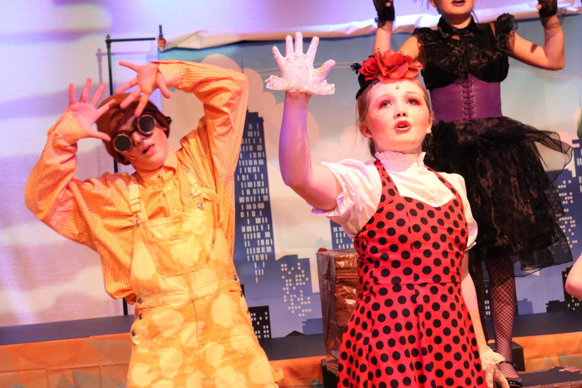 Young Rose actors singing a number from a performance.